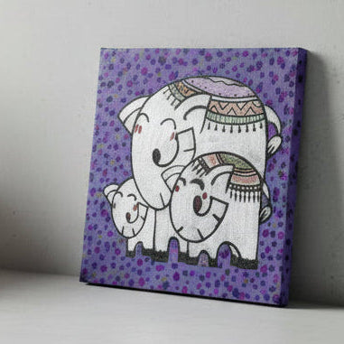 Canvas print with two elephants on a purple background with black spots, placed on a wooden surface.